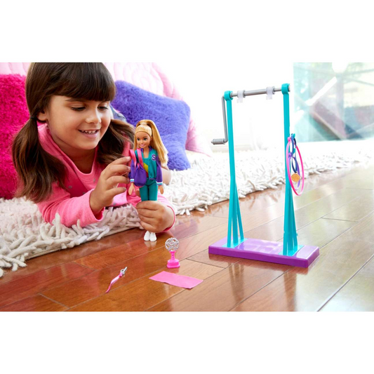 Barbie Team Stacie™ Doll and Gymnastics Playset with Spinning Bar and 7 Themed Accessories for 3 to 7 Year Olds GBK59