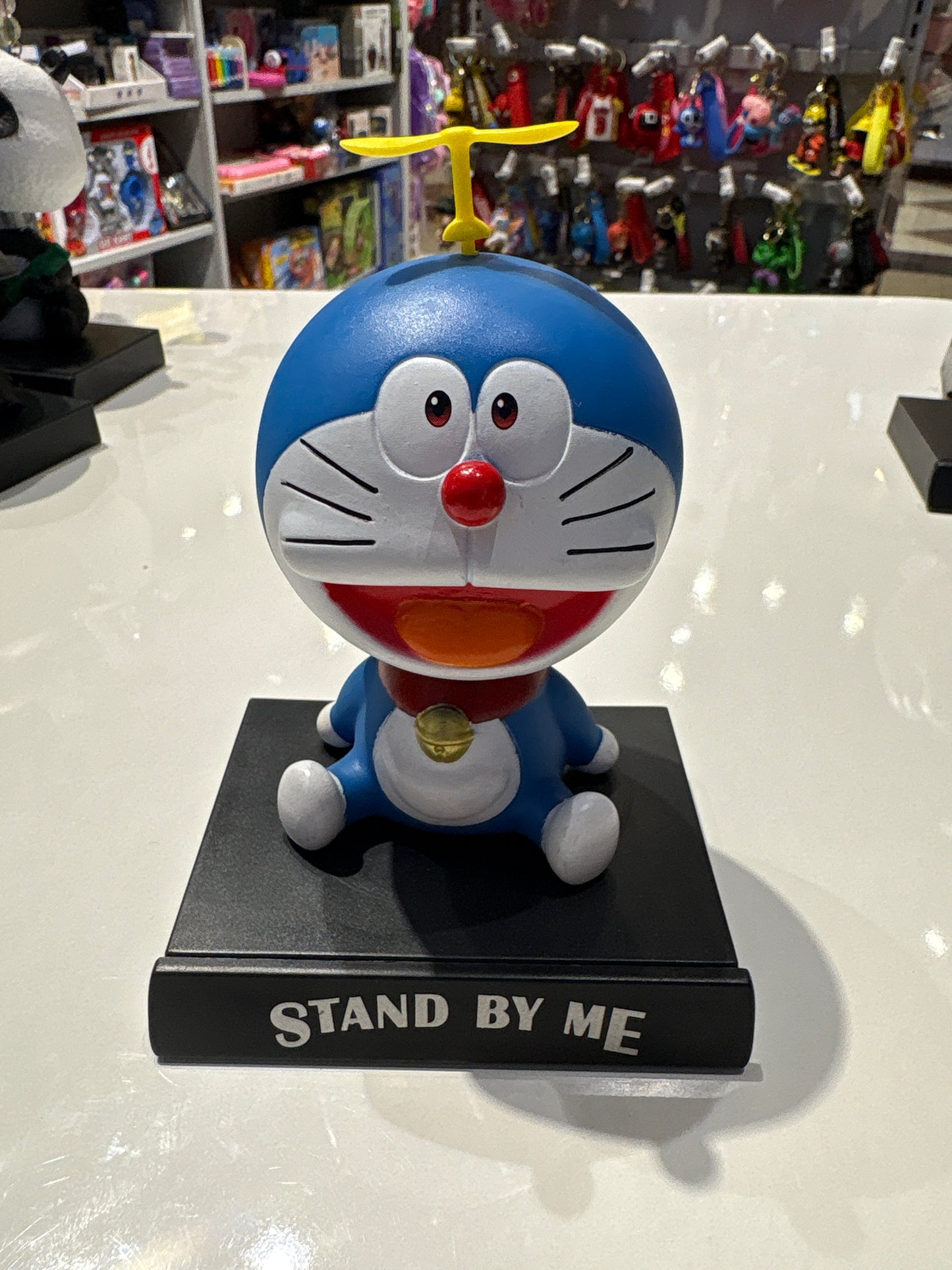 Car Dashboard and Home Decoration Accessories Bobble Shaking Head Avengers (12 Cms_Brown) Free : 3M Double Side Tape