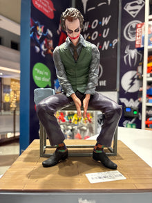 Joker Sitting on Chair Premium Action Figure with Display Base