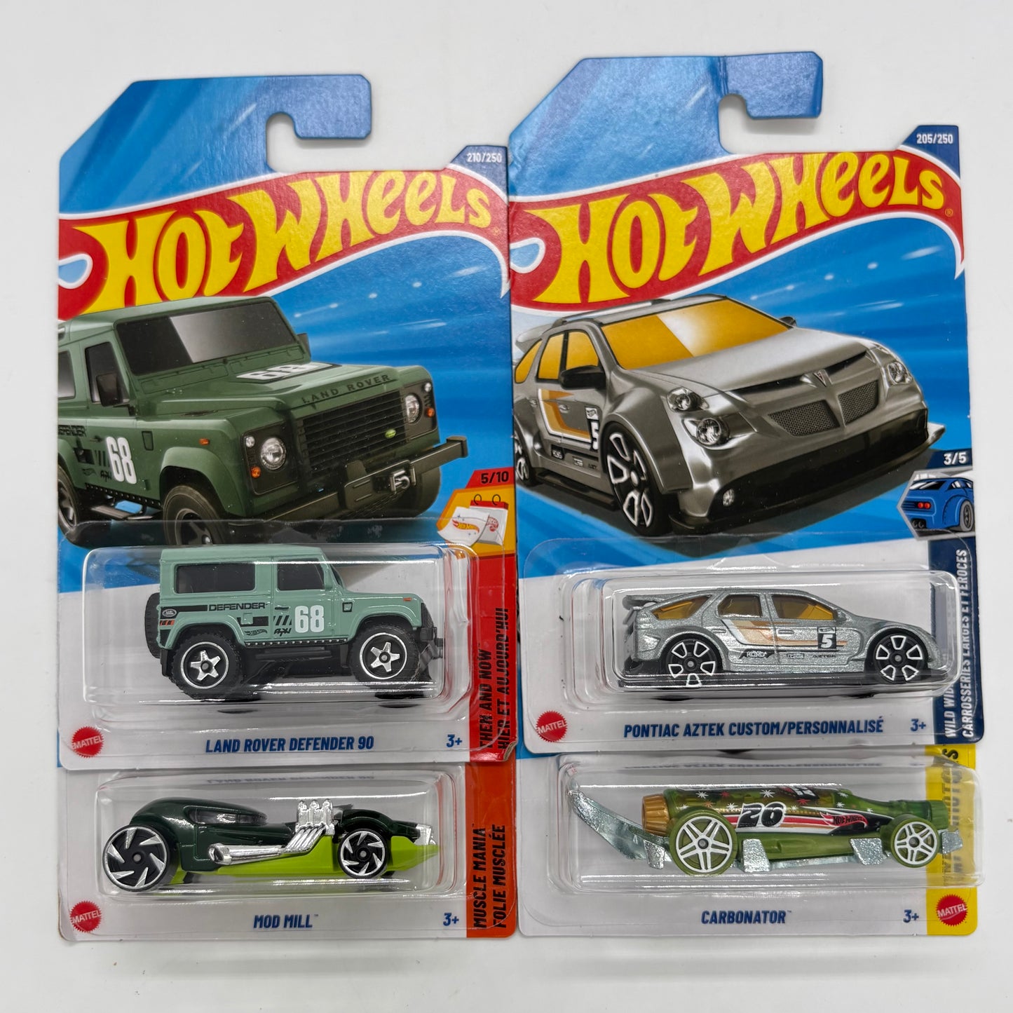 Hot Wheels 1:64 Die-Cast Set of 4 - Pontiac Aztek Custom, Land Rover Defender 90, Carbonator, Mod Mill
