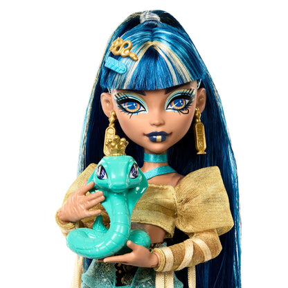 Monster High Cleo De Nile Doll in Golden Blouse and Layered Skirt, Includes Pet Cobra Hissette and Accessories Like a Backpack, Snack and Scroll