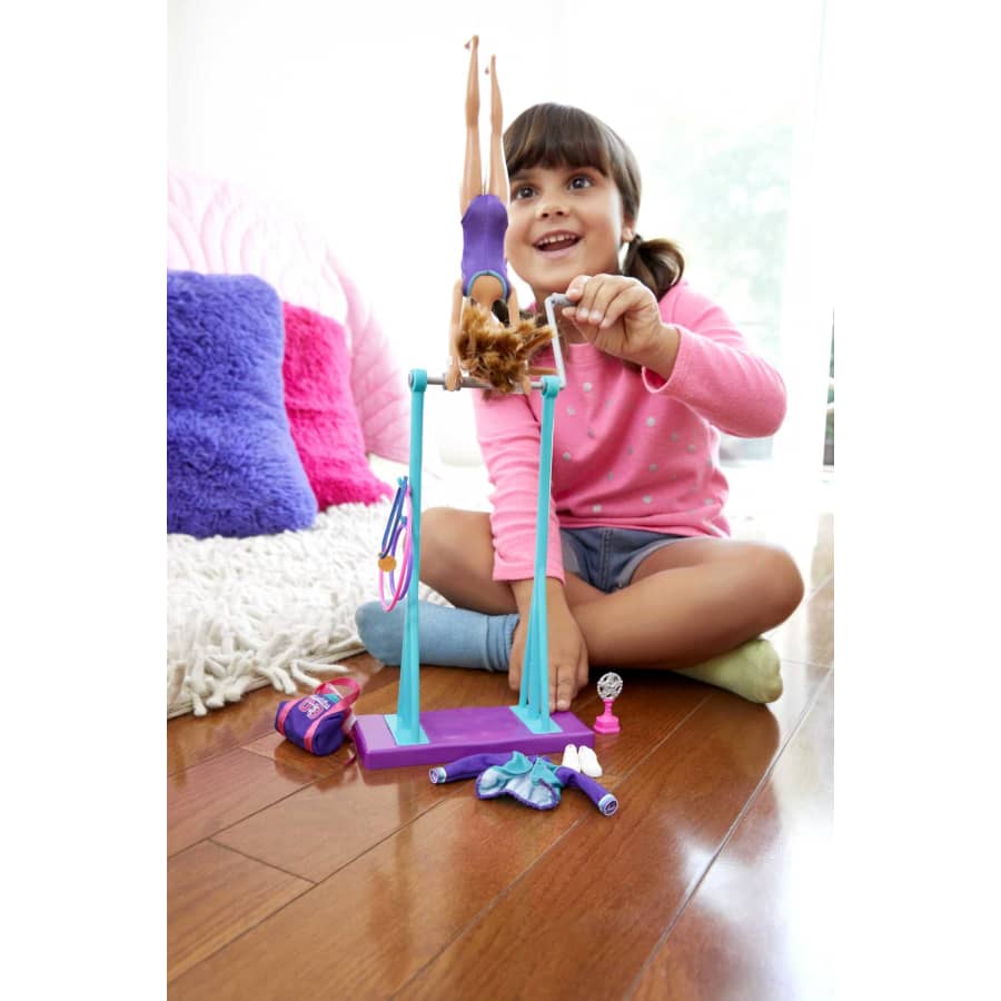 Barbie Team Stacie™ Doll and Gymnastics Playset with Spinning Bar and 7 Themed Accessories for 3 to 7 Year Olds