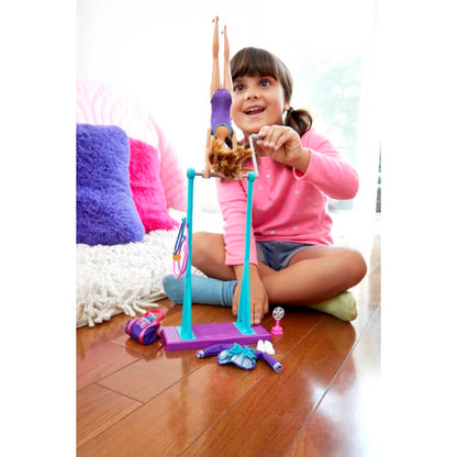 Barbie Team Stacie™ Doll and Gymnastics Playset with Spinning Bar and 7 Themed Accessories for 3 to 7 Year Olds