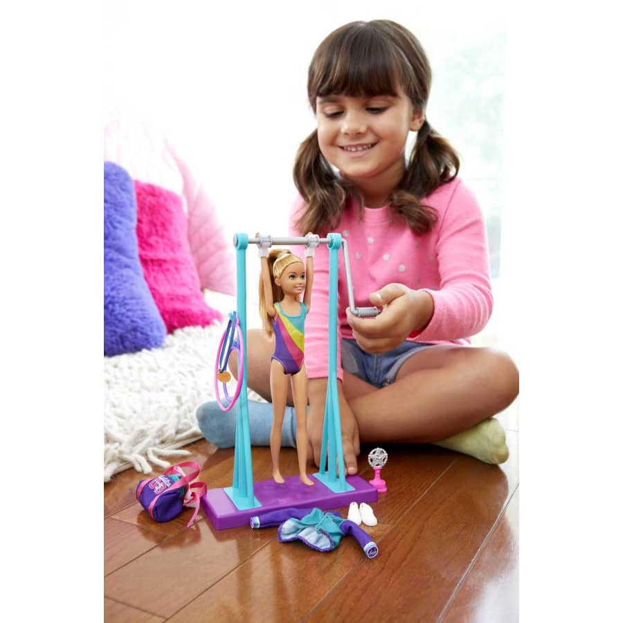Barbie Team Stacie™ Doll and Gymnastics Playset with Spinning Bar and 7 Themed Accessories for 3 to 7 Year Olds