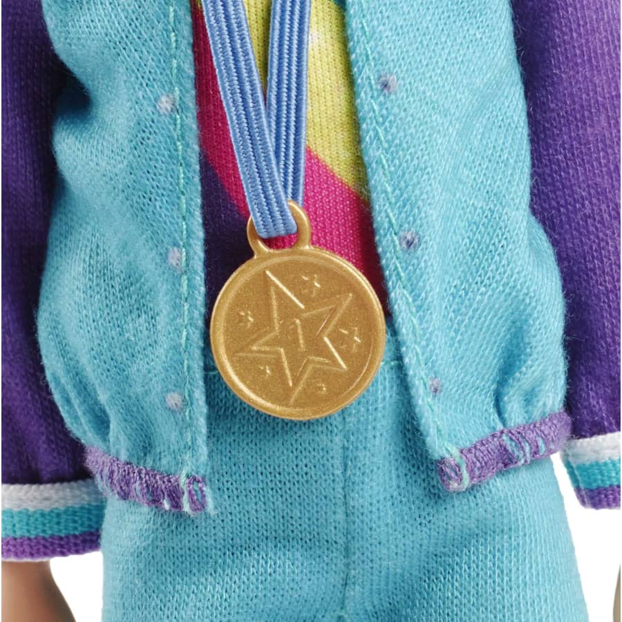 Barbie Team Stacie™ Doll and Gymnastics Playset with Spinning Bar and 7 Themed Accessories for 3 to 7 Year Olds