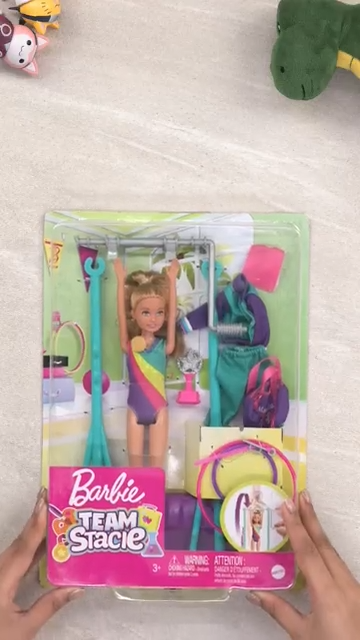 Barbie Team Stacie™ Doll and Gymnastics Playset with Spinning Bar and 7 Themed Accessories for 3 to 7 Year Olds